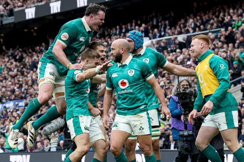 Ireland's James Ryan celebrates with teammates Jack Crowley, Garry Ringrose and Ciaran Frawley after Jamison Gibson-Park scores Ireland's first try in the Six Nations victory against England at Twickenham on February 21st. Photograph: Billy Stickland/Inpho