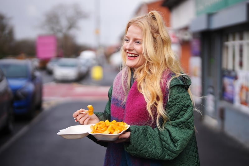 New Green Party MP Hannah Spencer stops to order lunch at Sue's takeaway in Levenshulme, Manchester. Photograph: Christopher Furlong/Getty Images