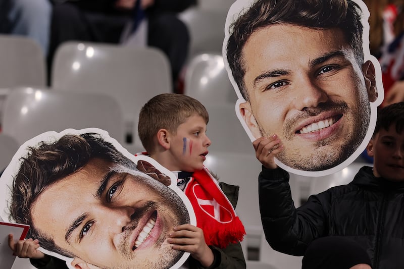 A view of France fans with cutouts of Antoine Dupont ahead of the game. Photograph: Billy Stickland/Inpho