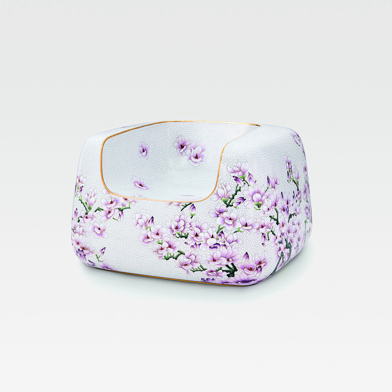 Floral porcelain square bowl with purple flowers and gold trim on a white background.