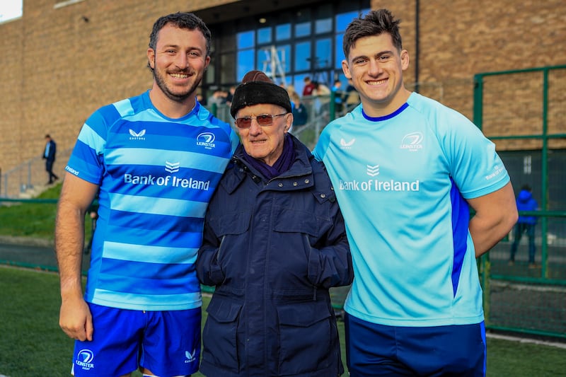 Fr Michael Sheil with former Clongowes pupils,  now rugby players, Will Connors (left) and Dan Sheehan.