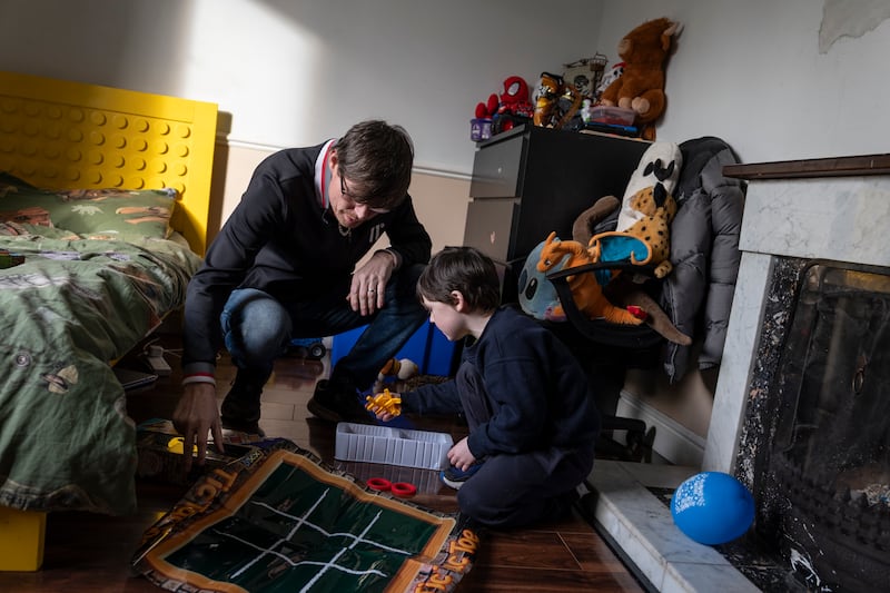 Alan LaCasse and his five-year-old son Joshua playing together at the family home near Geashill in Co Laois in January. Photograph: Paulo Nunes dos Santos