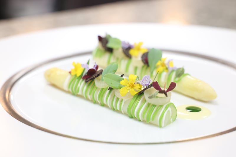 White asparagus garnished with herbs grown at Belvedere College created by Mickael Viljanen of Chapter One. Photograph: Enda O'Dowd