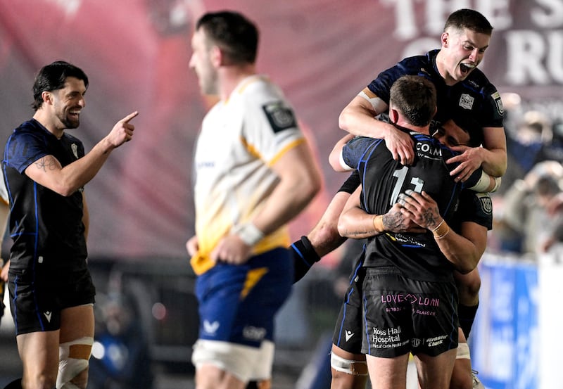 Glasgow Warriors' Ollie Smith celebrates scoring a try with team-mates. Photograph: Craig Watson/Inpho