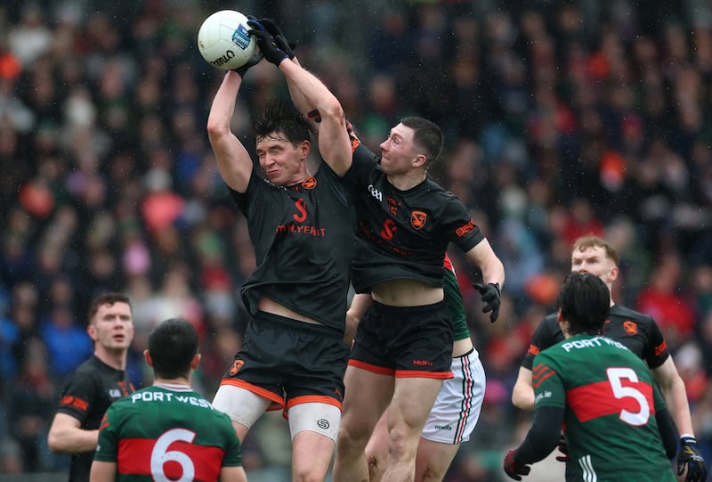 Armagh’s Ben Crealey and Oisín Conaty rise highest to win possession. Photograph: James Crombie/Inpho