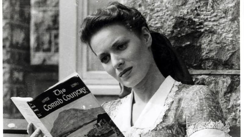 Maureen O’Hara reading Richard Hayward’s book The Corrib Country while taking a break from her role as Mary Kate Danaher in The Quiet Man.