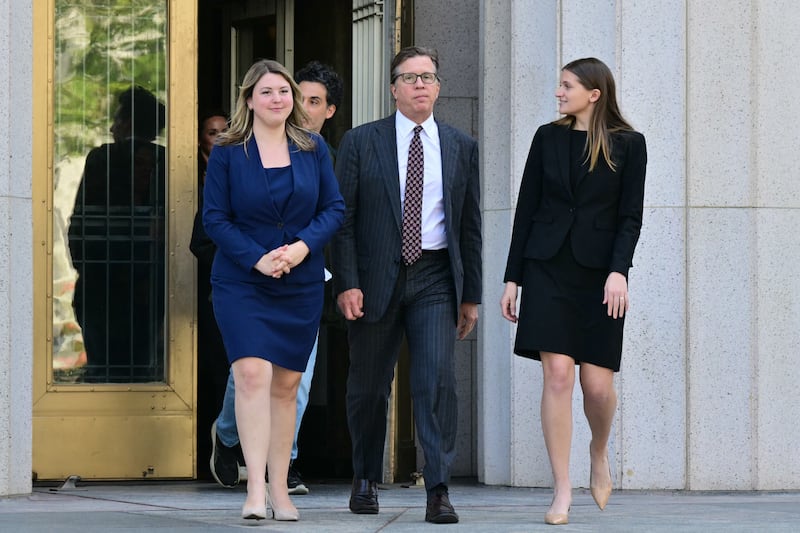 The plaintiff's lawyer Mark Lanier (centre) outside the Los Angeles court. Photograph: Frederic J Brown/AFP/Getty Images
