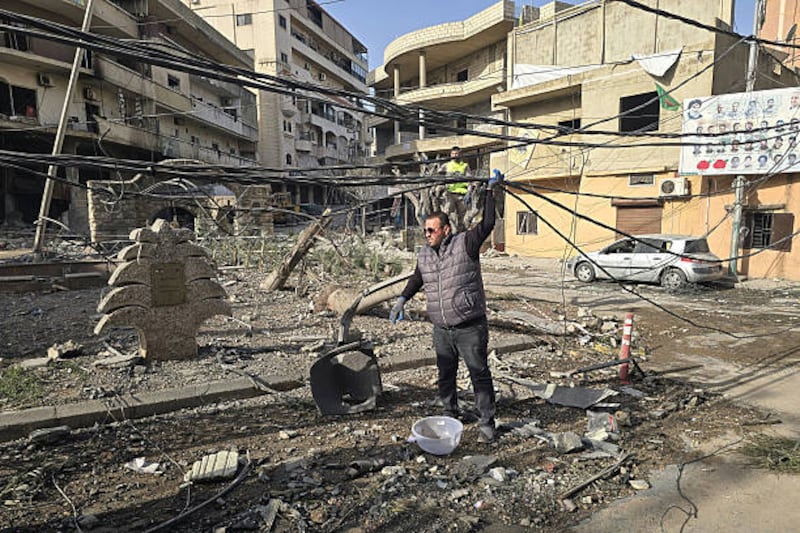 Municipality workers assess the damage in the aftermath of overnight Israeli airstrikes in the southern Lebanese coastal city of Tyre on Thursday. Photograph: Kawnat Haju/AFP via Getty Images