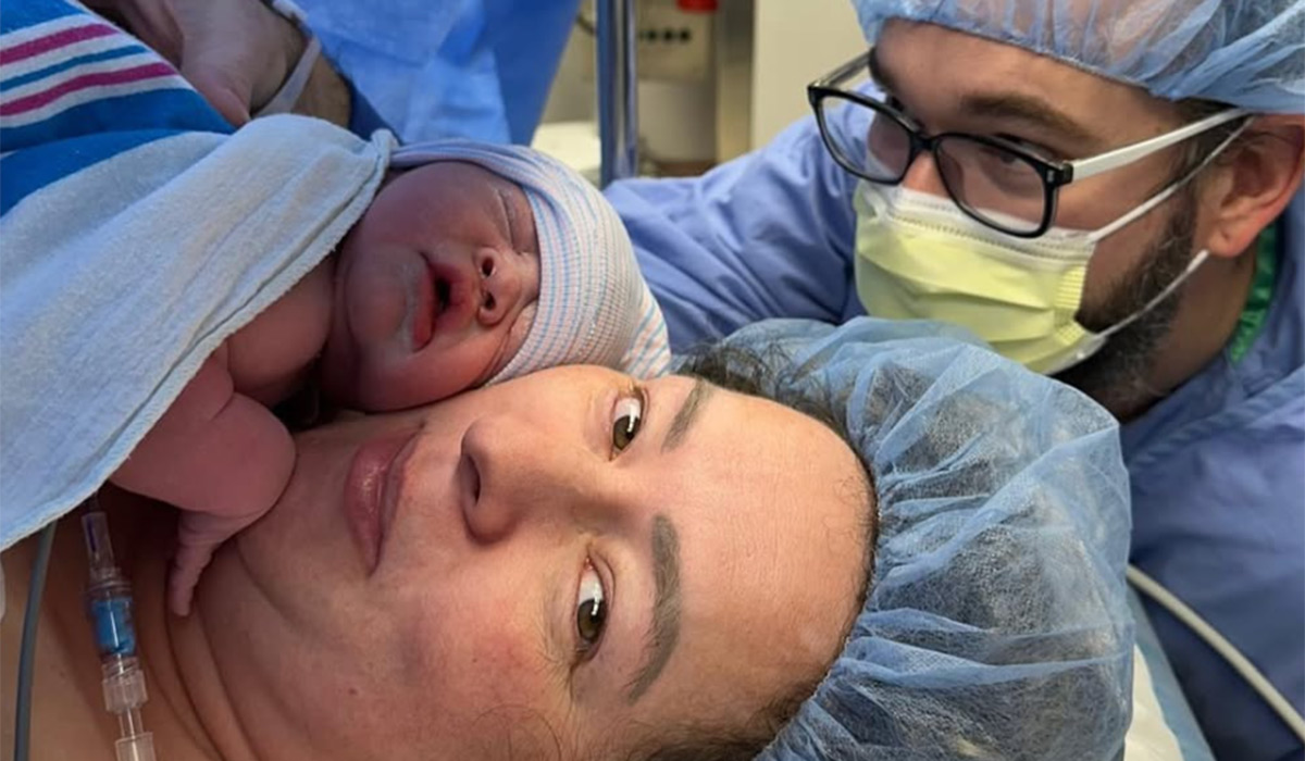 Rosemary MacCabe and her husband Brandin with their newborn son Roman