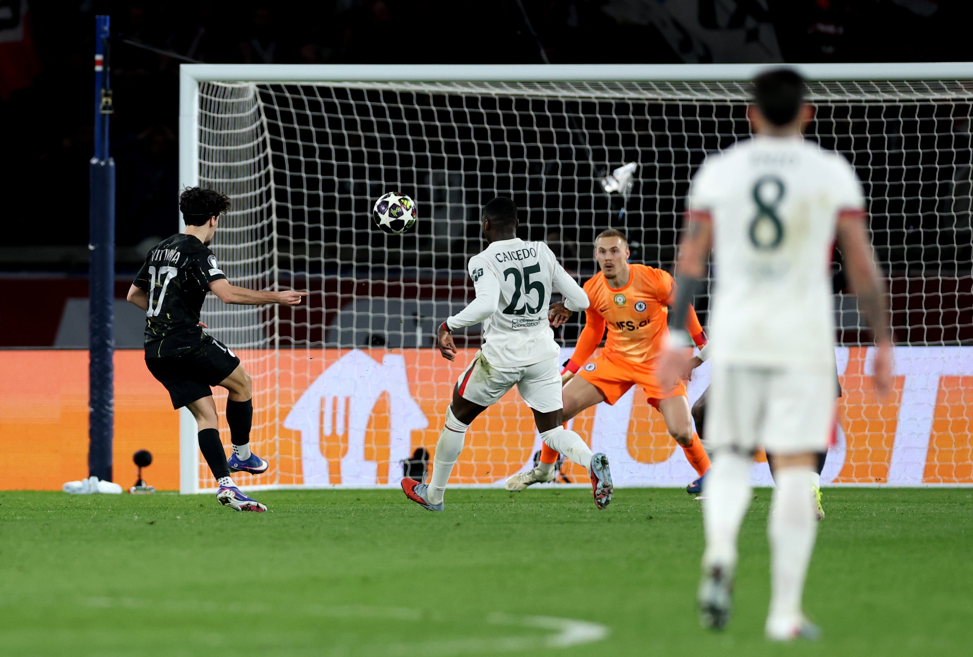 Vitinha lofts the ball over a stranded Jorgensen