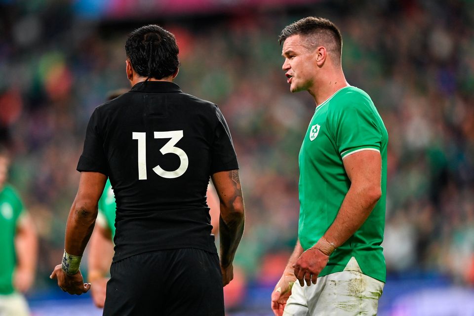 Johnny Sexton exchanges words with New Zealand's Rieko Ioane during the 2023 Rugby World Cup quarter-final. Photo: Ramsey Cardy/Sportsfile