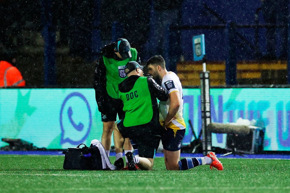 Harry Byrne receives medical attention during Leinster's United Rugby Championship defeat to Cardiff in Wales last Friday. Photo: Chris Fairweather/Sportsfile
