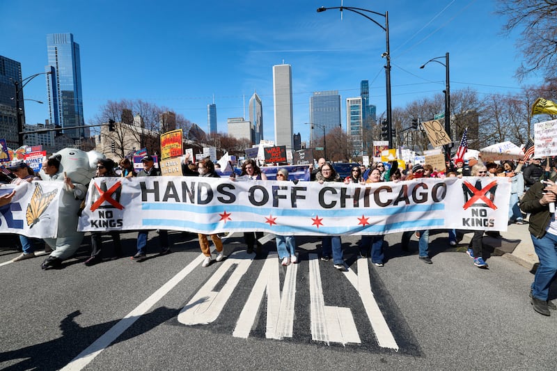 Demonstrators in Chicago march against the Trump administration. Photograph: Kamil Krzaczynski/Getty Images