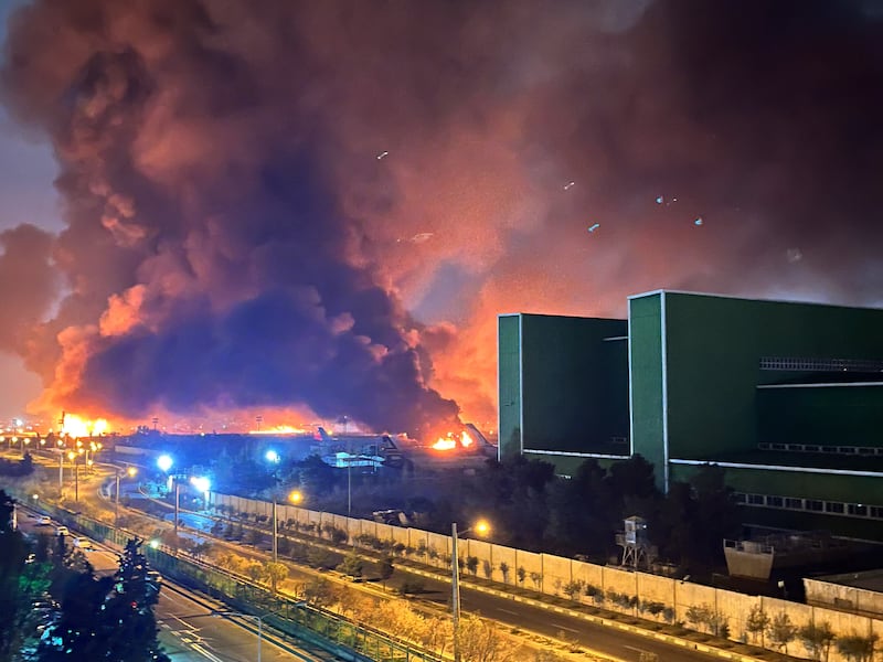 Fires burn at the site of air strikes at Mehrabad International Airport in Tehran on Saturday. Photograph: Sepehr-M/Middle East Images/AFP via Getty