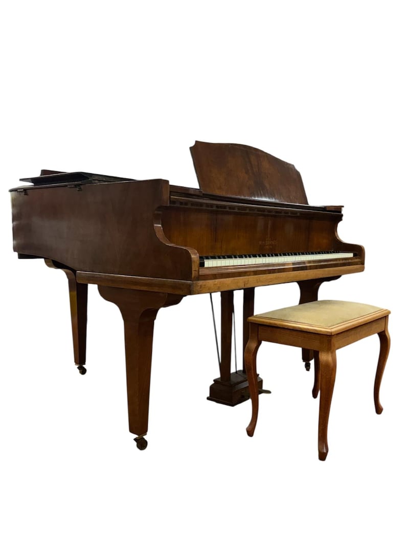 The Barnes of London baby grand piano in walnut case (€300-€500) for sale at Mullen's Laurel Park, Bray