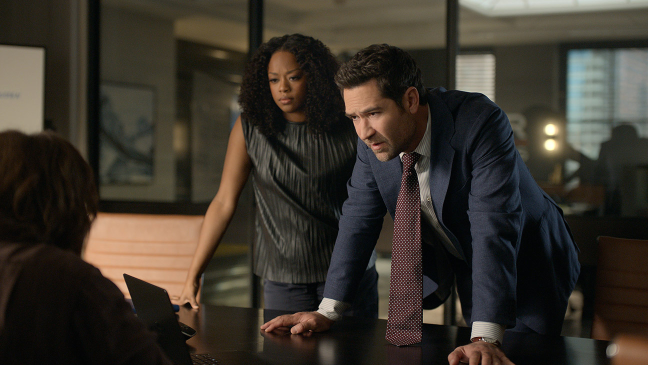 (L to R) Jazz Raycole as Izzy Letts, Manuel Garcia-Rulfo as Mickey Haller in episode 404 of The Lincoln Lawyer.