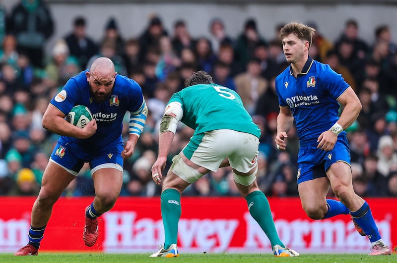 Italy's Simone Ferrari runs at Ireland's James Ryan. Photograph: Ben Brady/Inpho