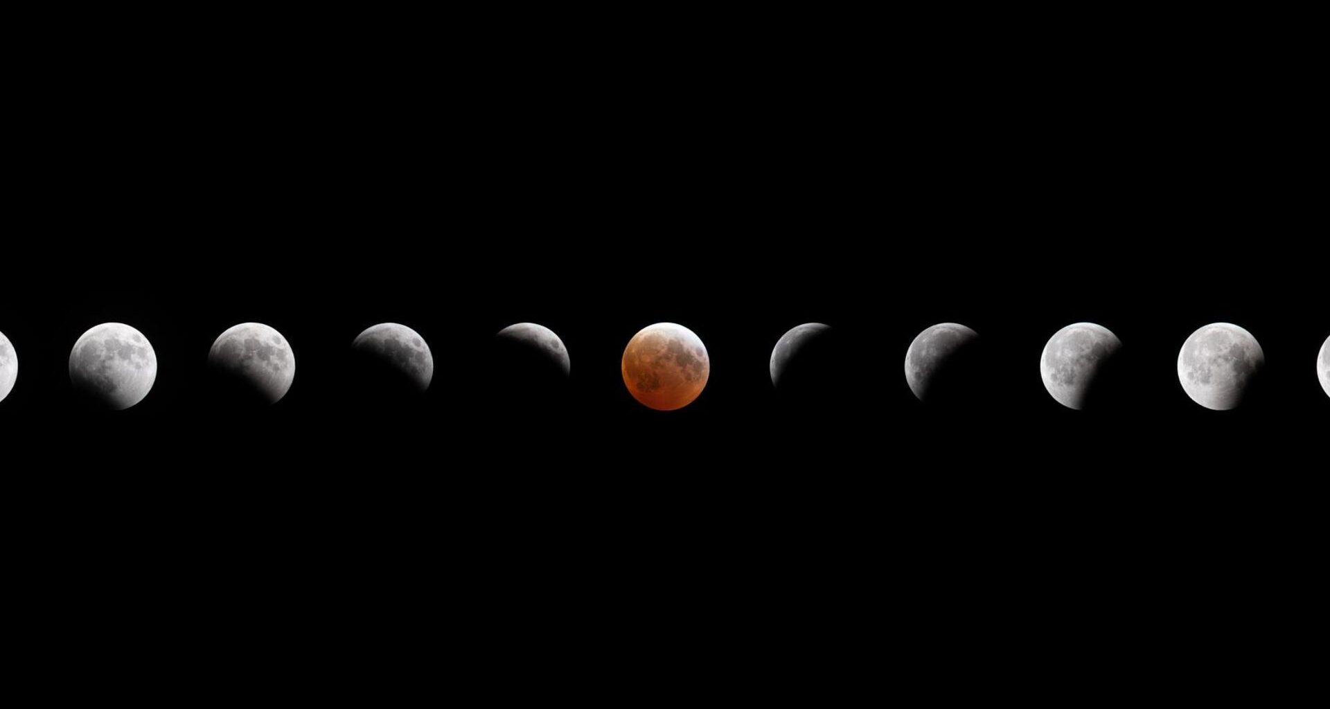 A composite image showing the small gray sphere of the moon across a dark night sky as it reaches various phases of a lunar eclipse.