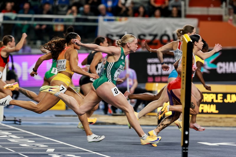 Ireland’s Lauren Roy crosses the finish line in the semi-finals of the 60m. Photograph: Morgan Treacy/Inpho