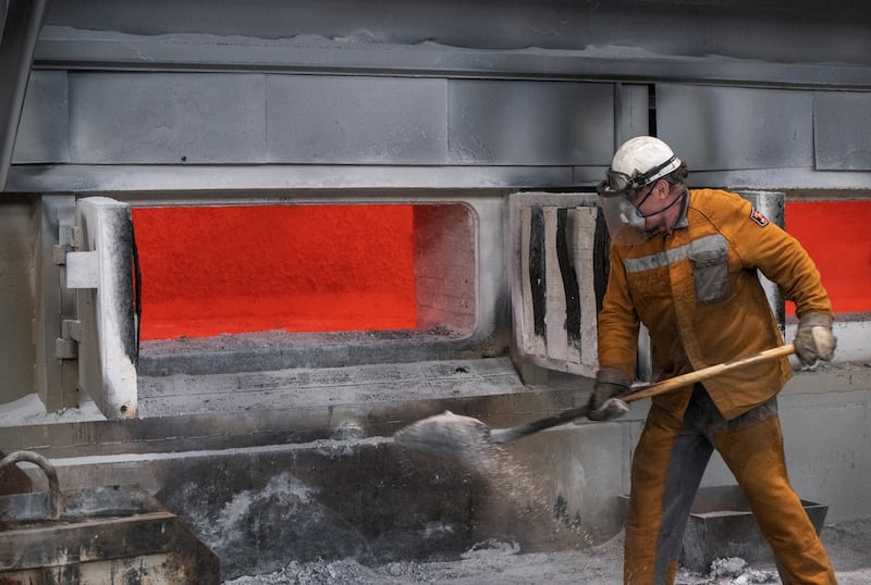 An employee works at a furnace at the Krasnoyarsk Aluminium Smelter (KrAZ) of Rusal in the Siberian city of Krasnoyarsk. Photograph: Alexander Manzyuk/Reuters
