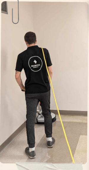 Rick Chorney mopping the floor