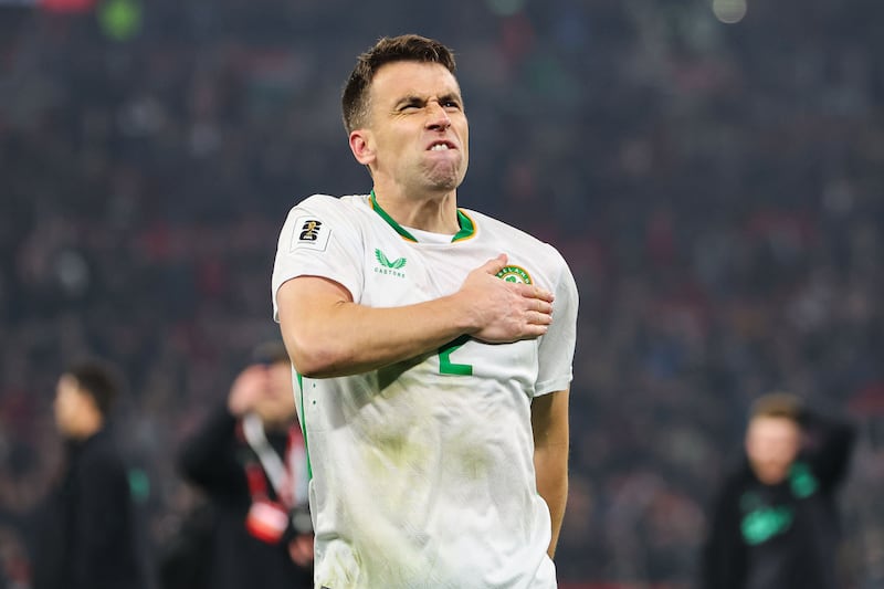 Séamus Coleman celebrates after Ireland's win over Hungary in Budapest. Photograph: Ryan Byrne/Inpho
