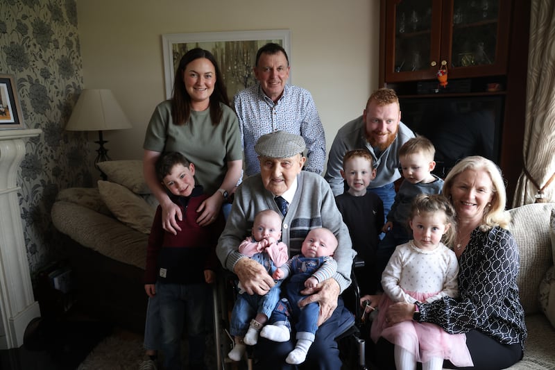 Paddy Claffey holding two of his great grandchildren, fifteen-week old twins Isabel and Dara Griffin. Also in photo (from left) Fiona Griffin (granddaughter) and her son Conor (5), Patrick Claffey (Paddy’s son), Adrian Claffey (grandson) with his two boys Shay (4) and Paidi (2) Claffey and Janet Claffey (Patrick’s wife) with Holly Griffin (3).   Photo: Bryan O’Brien / The Irish Times 
