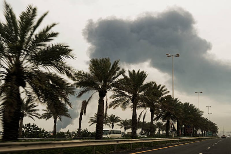 A plume of smoke rises after a reported Iranian strike on fuel tanks in Muharraq on Wednesday. Photograph: Fadhel Madhan/AFP via Getty Images