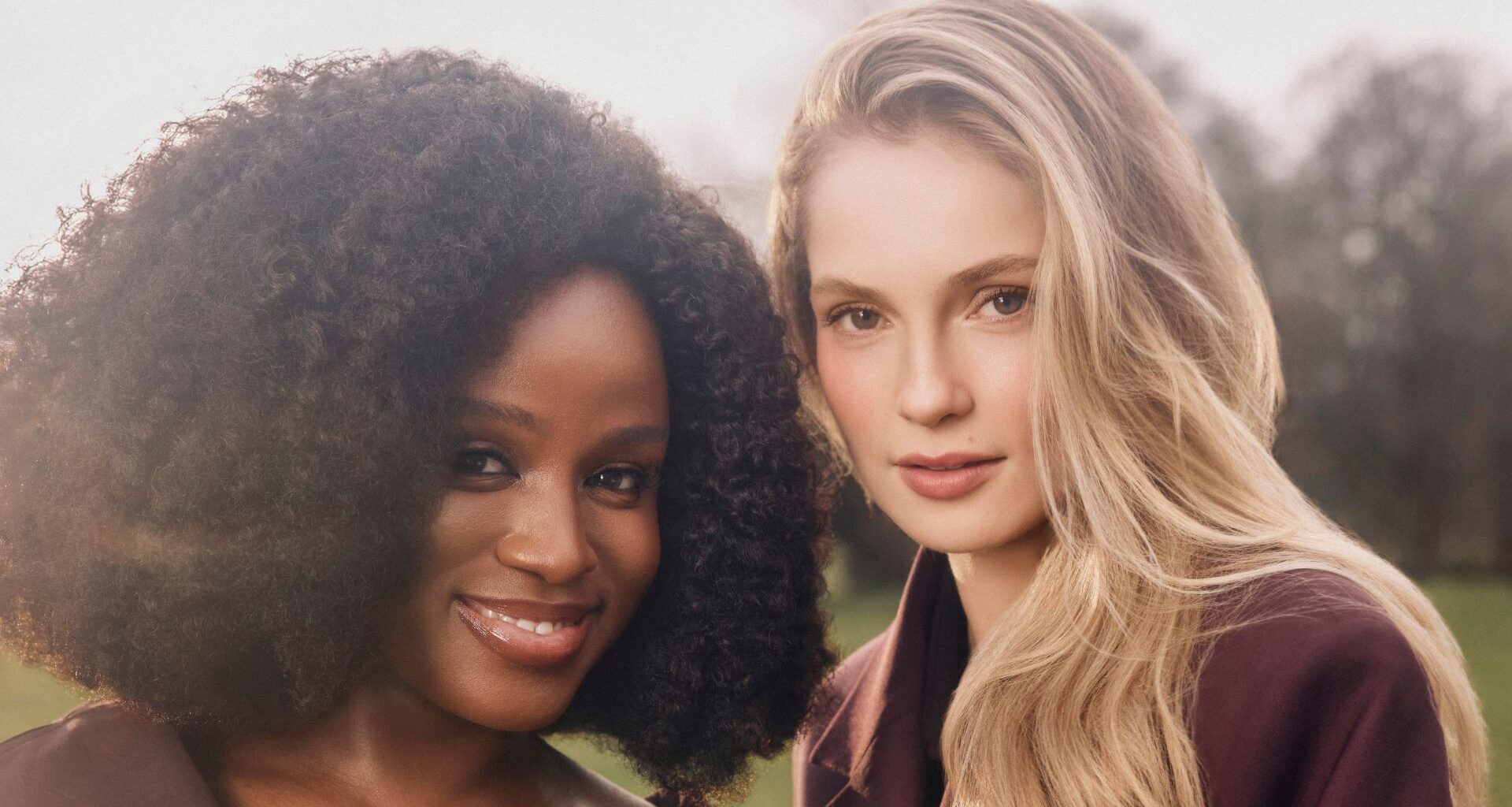 Masali Baduza and Hannah Dodd pose for a photo