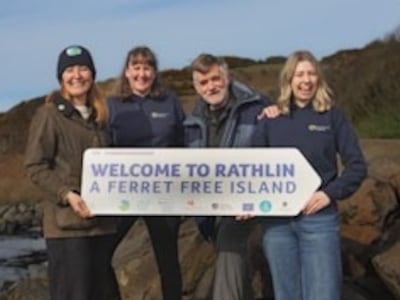 RSPB and Life Raft project staff mark the successful eradication of feral ferrets on Rathlin Island. Photograph: Tom McDonnell/RSPB/PA Wire 