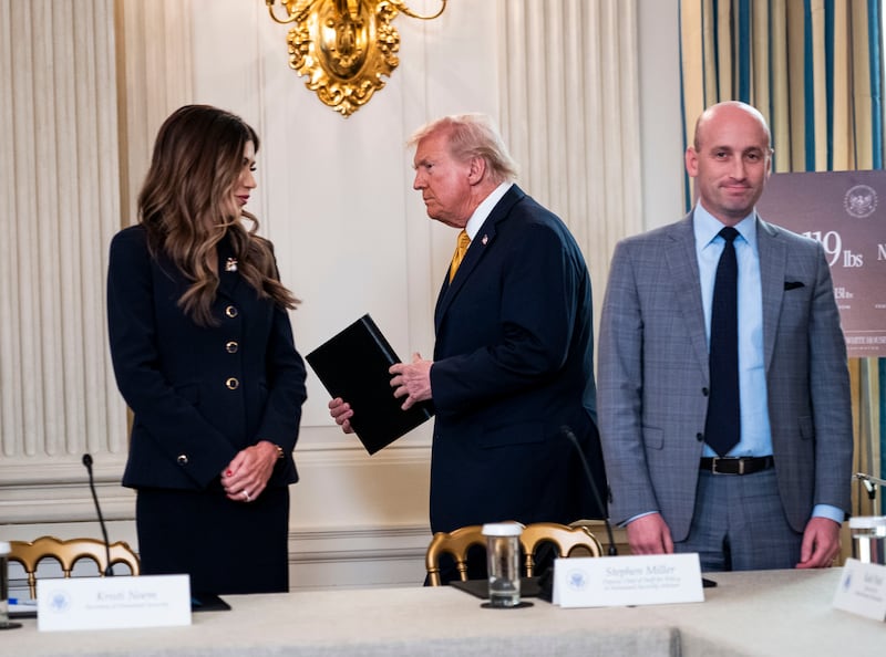 Kristi Noem, president Donald Trump and Stephen Miller, in Washington, Oct. 23, 2025. Photograph: Doug Mills/The New York Times               