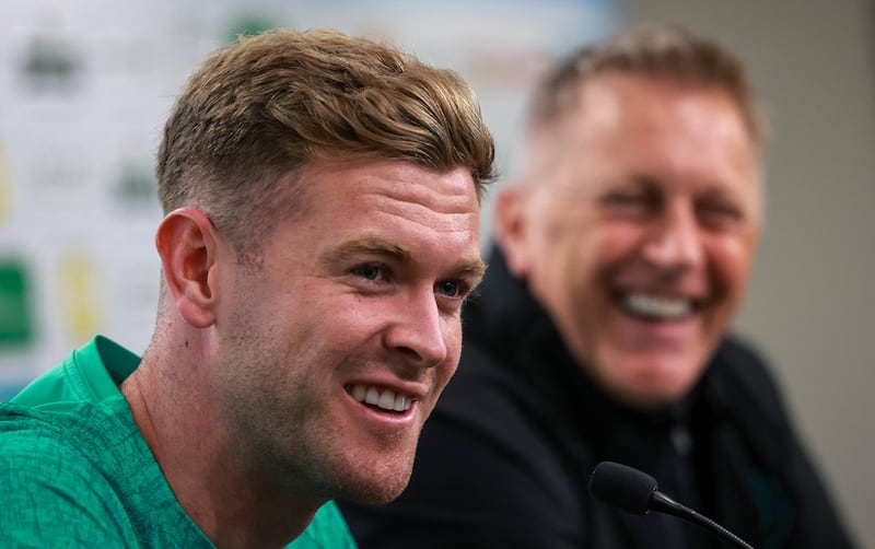 Republic of Ireland captain Nathan Collins alongside manager Heimir Hallgrímsson during a press conference last August. Photograph: Ryan Byrne/Inpho