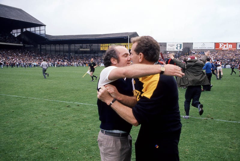 Galway manager Cyril Farrell and Kilkenny manager Pat Henderson embrace after the 1987 All-Ireland hurling final. Photograph: Billy Stickland/INPHO