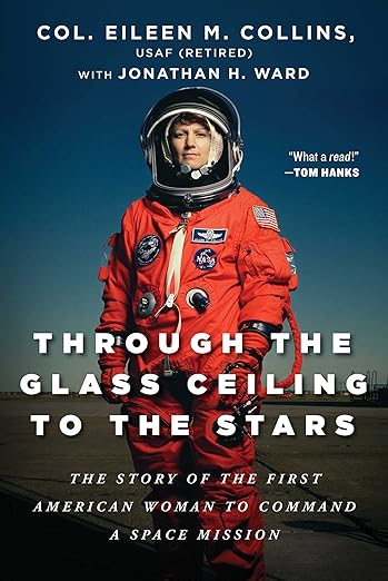 a book cover with a female astronaut in an orange spacesuit