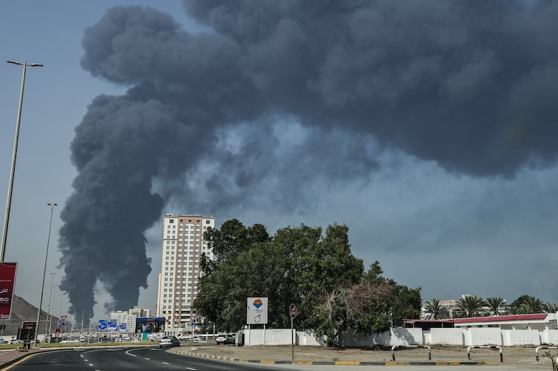 Smoke rises from the direction of an energy installation in the Gulf emirate of Fujairah on Saturday. Smoke could be seen rising from the direction of a major UAE energy installation, in what appeared to be the latest strike targeting the Gulf's petroleum facilities hours after the US struck Iran's Kharg Island. Photograph: AFP via Getty Images