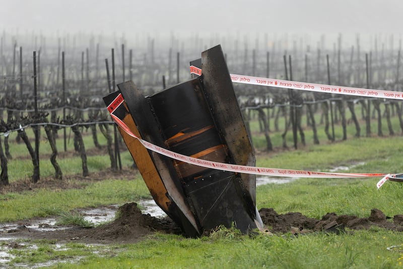 The tail section of a ballistic missile fired from Iran sticks out of the ground at a vineyard in the Israeli-controlled Golan Heights. Iran has continued firing waves of drones and missiles at Israel after the United States and Israel launched a joint attack on Iran early on February 28th. Photograph: Amir Levy/Getty Images
