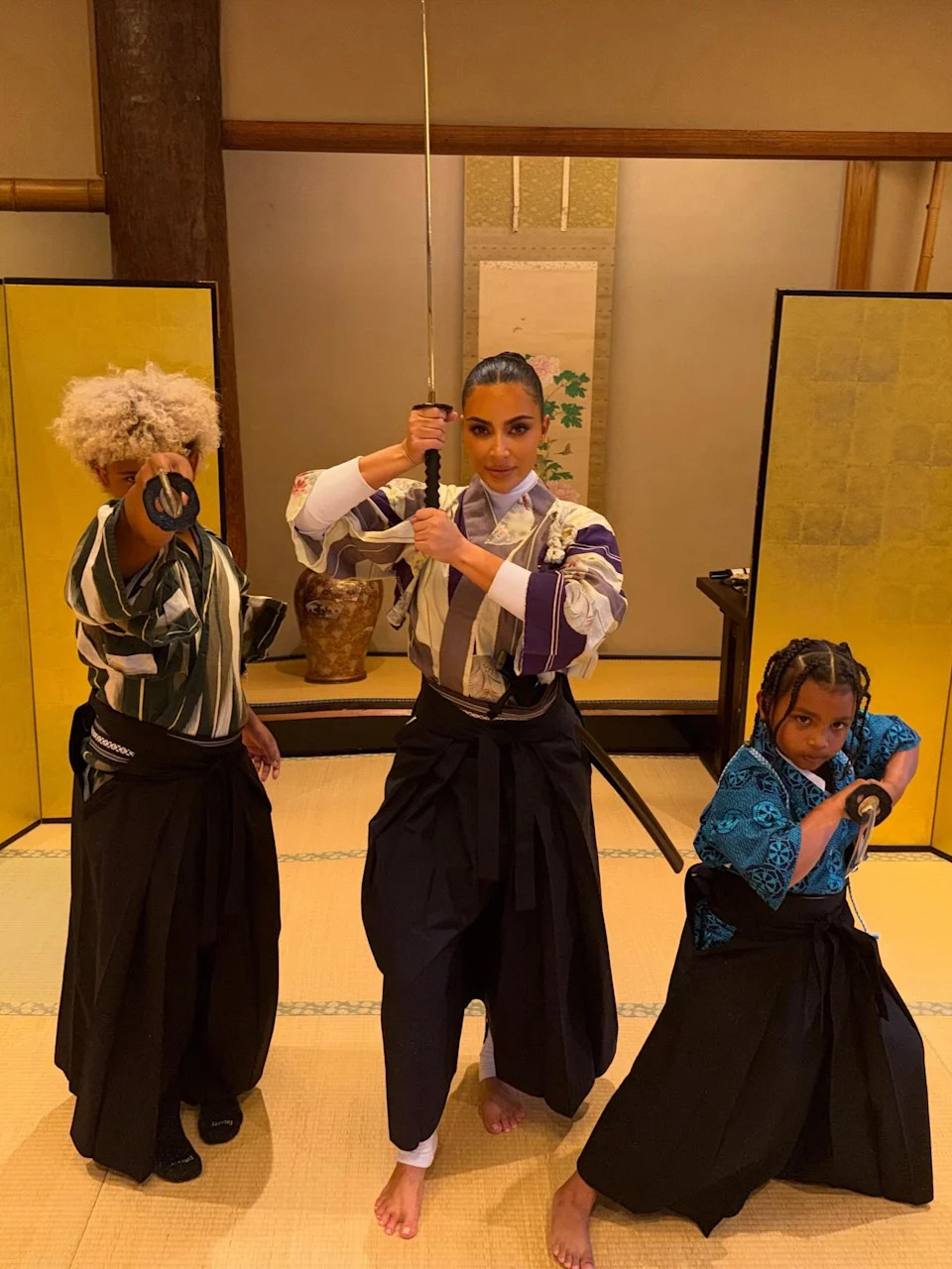 Khloé and Kim (seen above with her sons) have been enjoying time in Tokyo with their kids. Kim Kardashian/ Instagram