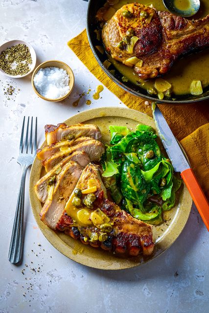 Hasselback Pork Chops with Pan Greens & Savoy Cabbage. Photo: Donal Skehan & Tara Fisher; Food styling: Charlotte O’Connell