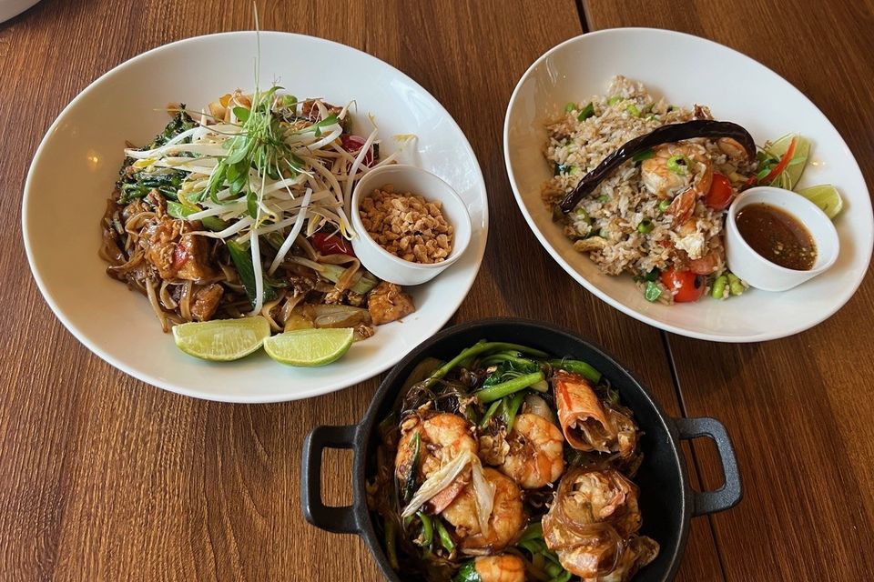 Clockwise from front: Kung op, phad Thai noodles, crab fried rice. Photo: Lucinda O'Sullivan.