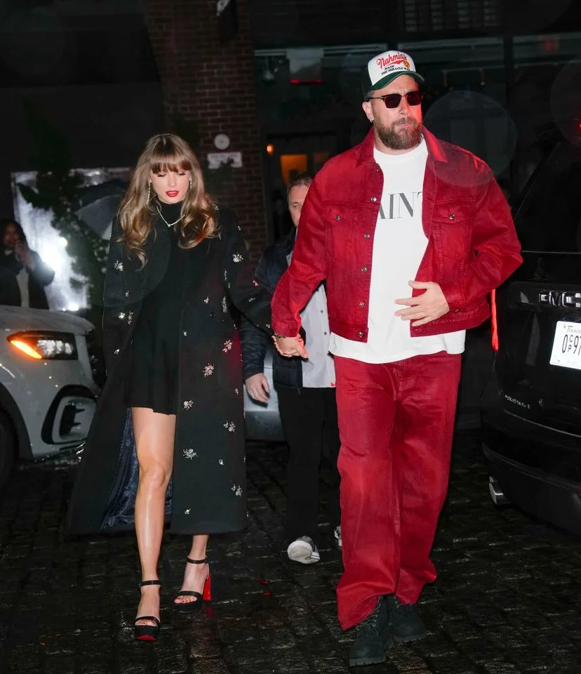 Taylor Swift and Travis Kelce in December 2024.Credit: Getty