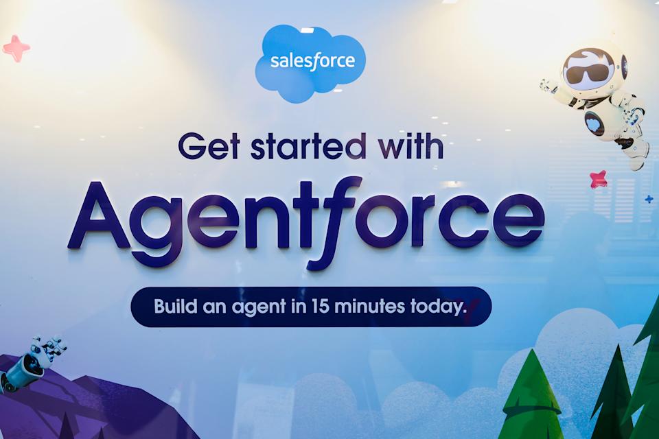 The Salesforce logo and Agentforce, the American cloud-based customer relationship management (CRM) and sales-focused software application, and the largest enterprise software firm, display the slogan ''See CRM + AI + Data + Trust across the entire customer journey'' during the Mobile World Congress 2025 in Barcelona, Spain, on March 5, 2025. (Photo by Joan Cros/NurPhoto via Getty Images)