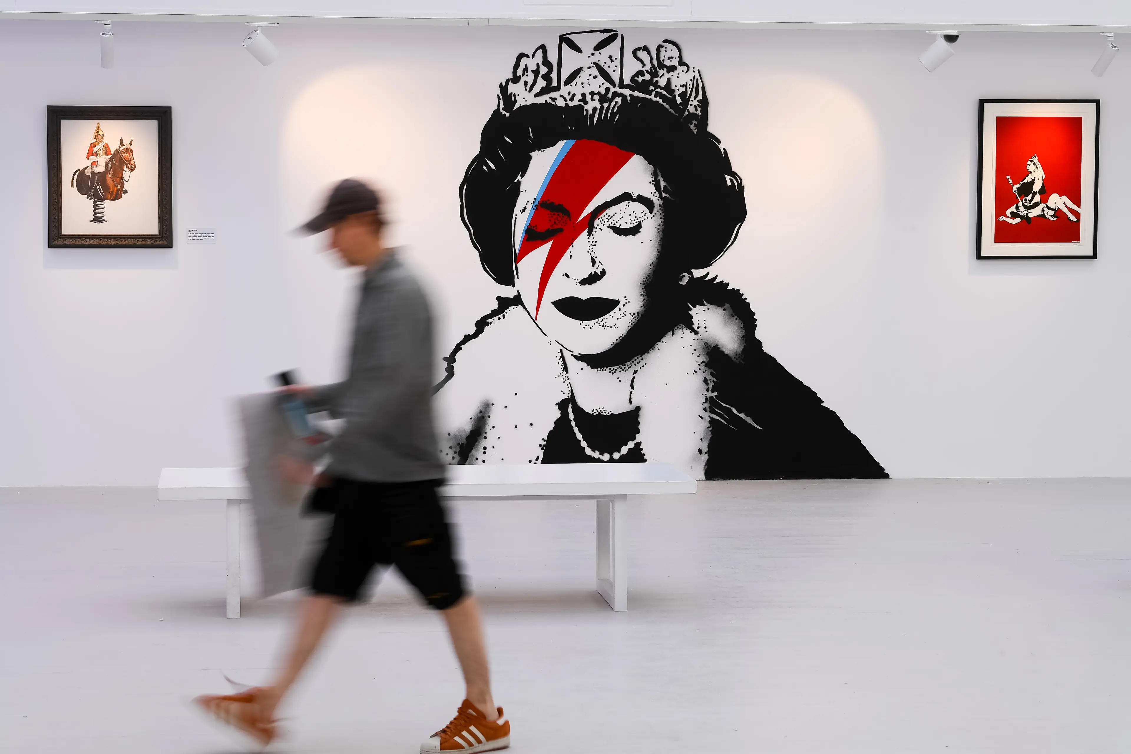 Banksy's portrait of the Queen, as seen at the Banksy Limitless Exhibition in London (Joe Maher/Getty Images)