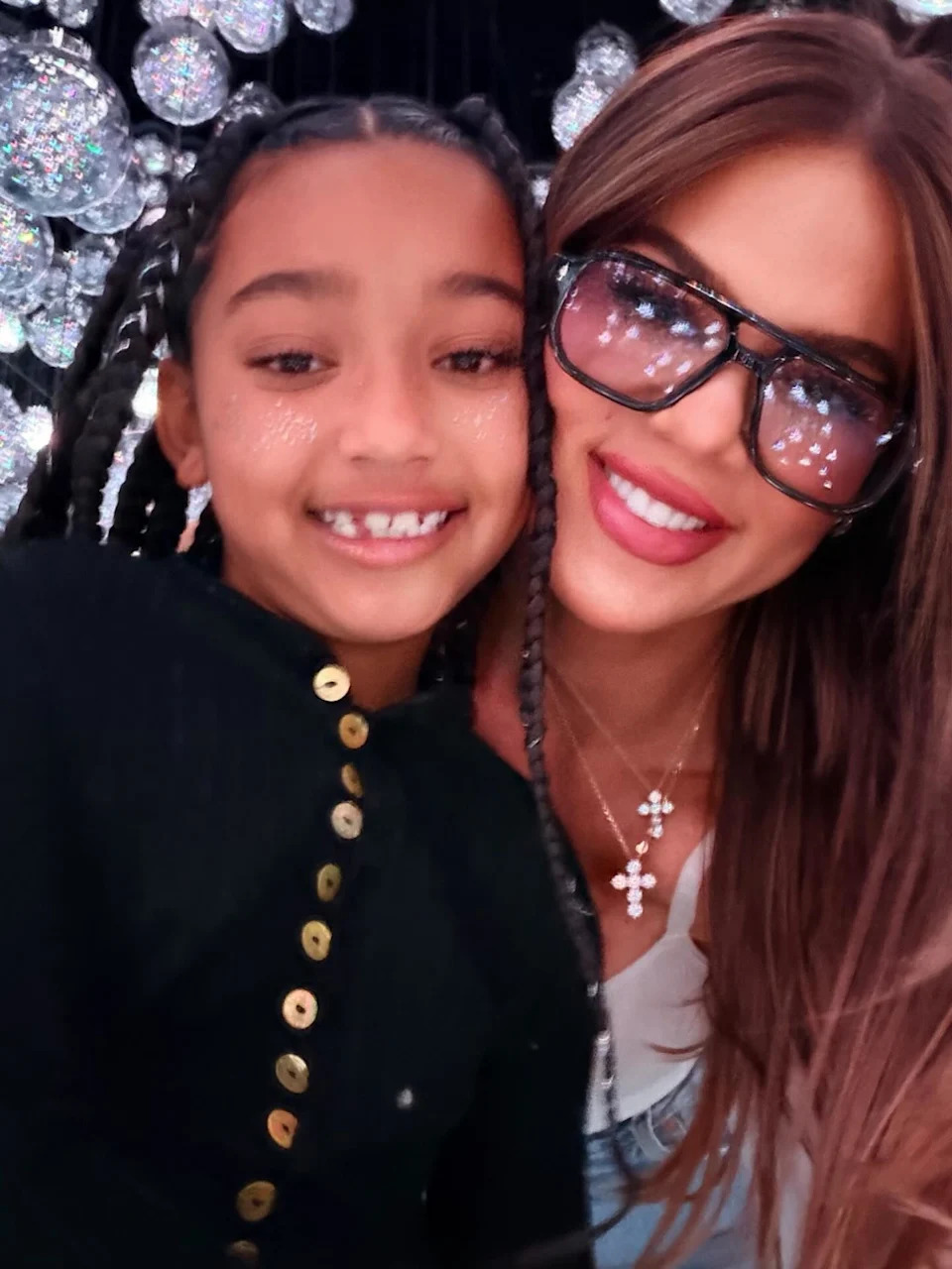 Another fan claimed Khloé’s face “looks…interesting.” (Pictured: Khloé and True Thompson.) khloekardashian/Instagram