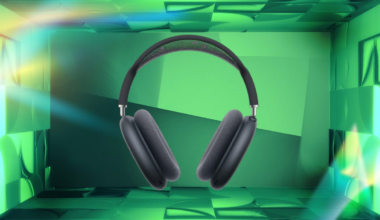 Apple AirPods Max 2 headphones in midnight with a green background