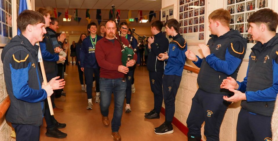Colaiste Bhride Carnew Ladies under 19 All Ireland Basketball Champions arrive to a guard of honour. PHOTO: Sabrina Ffrench