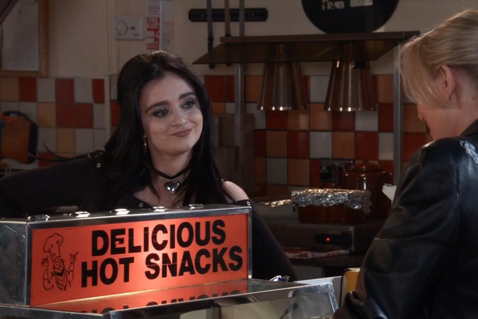 food stall serving hot snacks