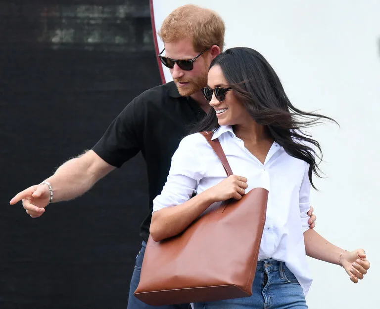 Prince Harry and Meghan Markle attend the Wheelchair Tennis at the Invictus Games