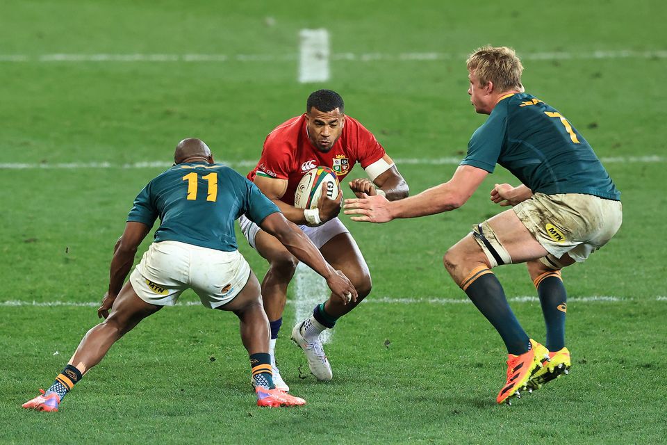 The British & Irish Lions' Anthony Watson is tackled by South Africa's Peiter-Steph du Toit (r) and Makazole Mapimpi during the first Test match in 2021 in Cape Town. Photo: David Rogers/Getty Images