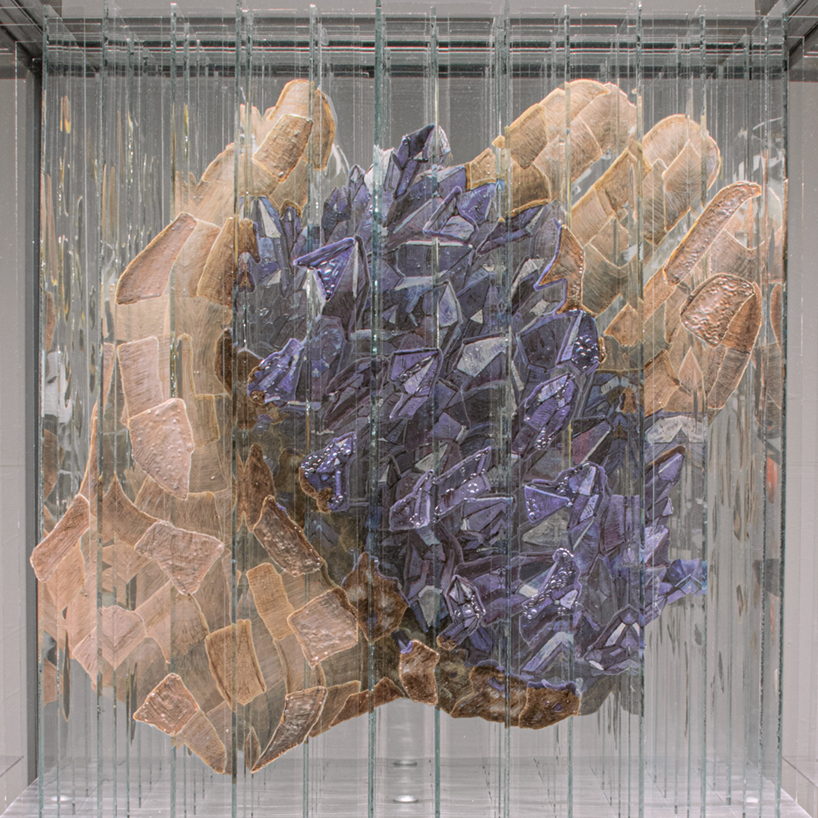 anamorphic installation by thomas medicus rotates into four shifting hand images - 2