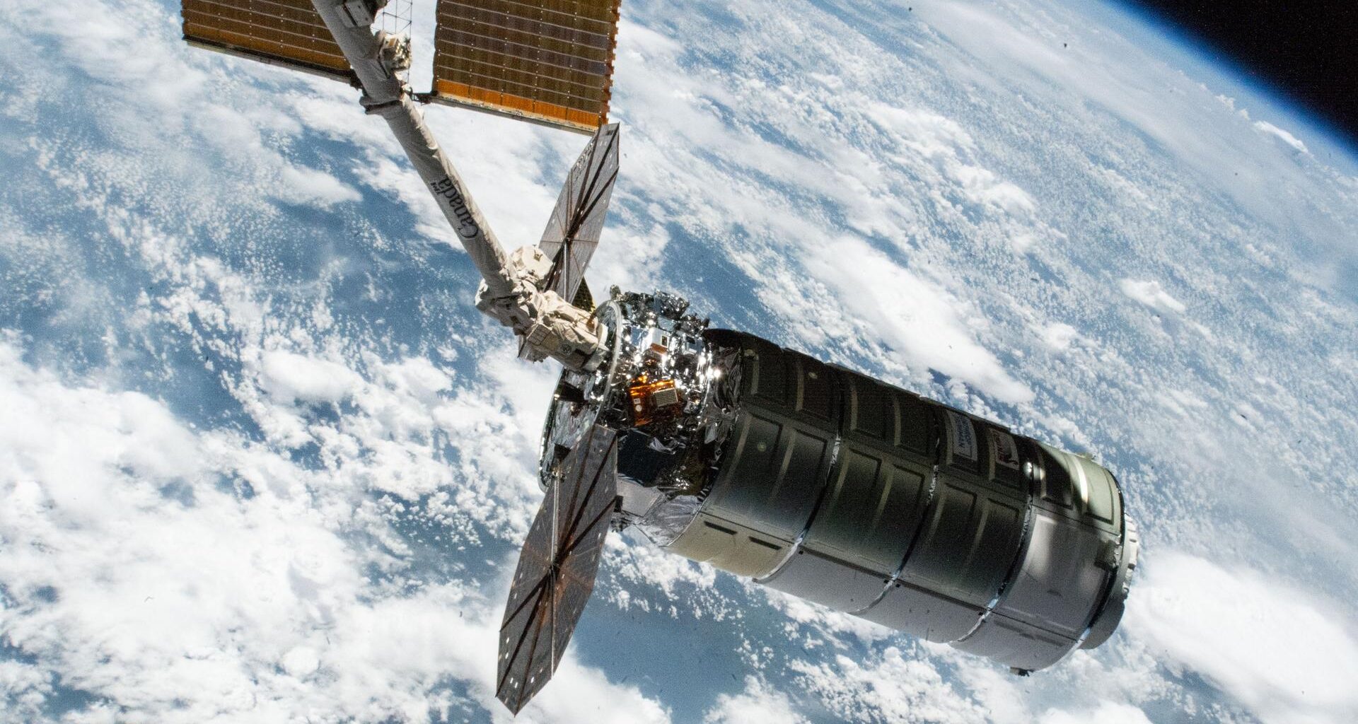 Northrop Grumman’s Cygnus XL cargo spacecraft, loaded with more than 11,000 pounds of science and supplies for Expedition 73, is seen grasped by the International Space Station’s Canadarm2 after its capture on Sept. 18, 2025, as both spacecraft orbited 257 miles above Tanzania.